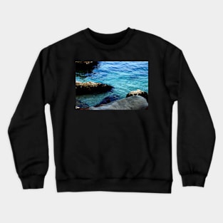 Blue waters of the Adriatic sea washing some stones Crewneck Sweatshirt